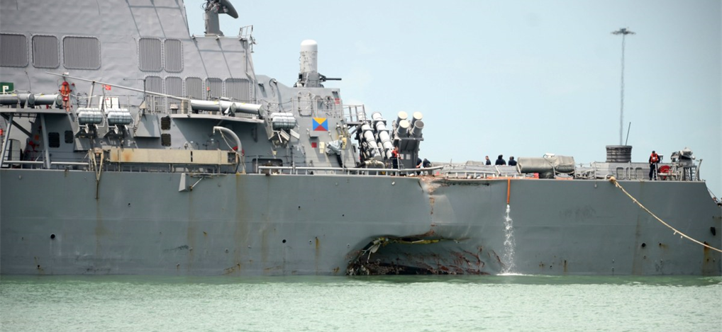 USS McCain with damage from the collision 